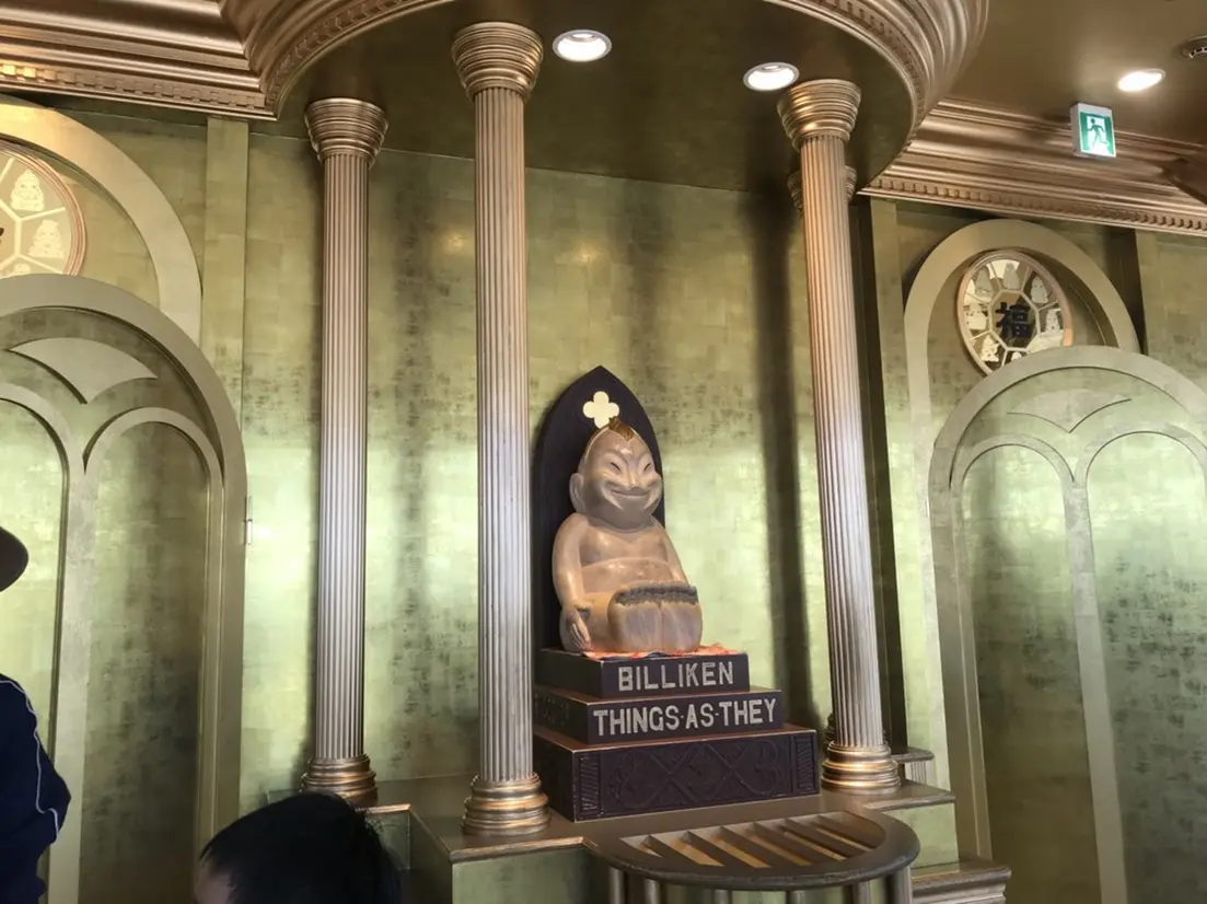 Golden Billiken-san statue in Tsutenkaku