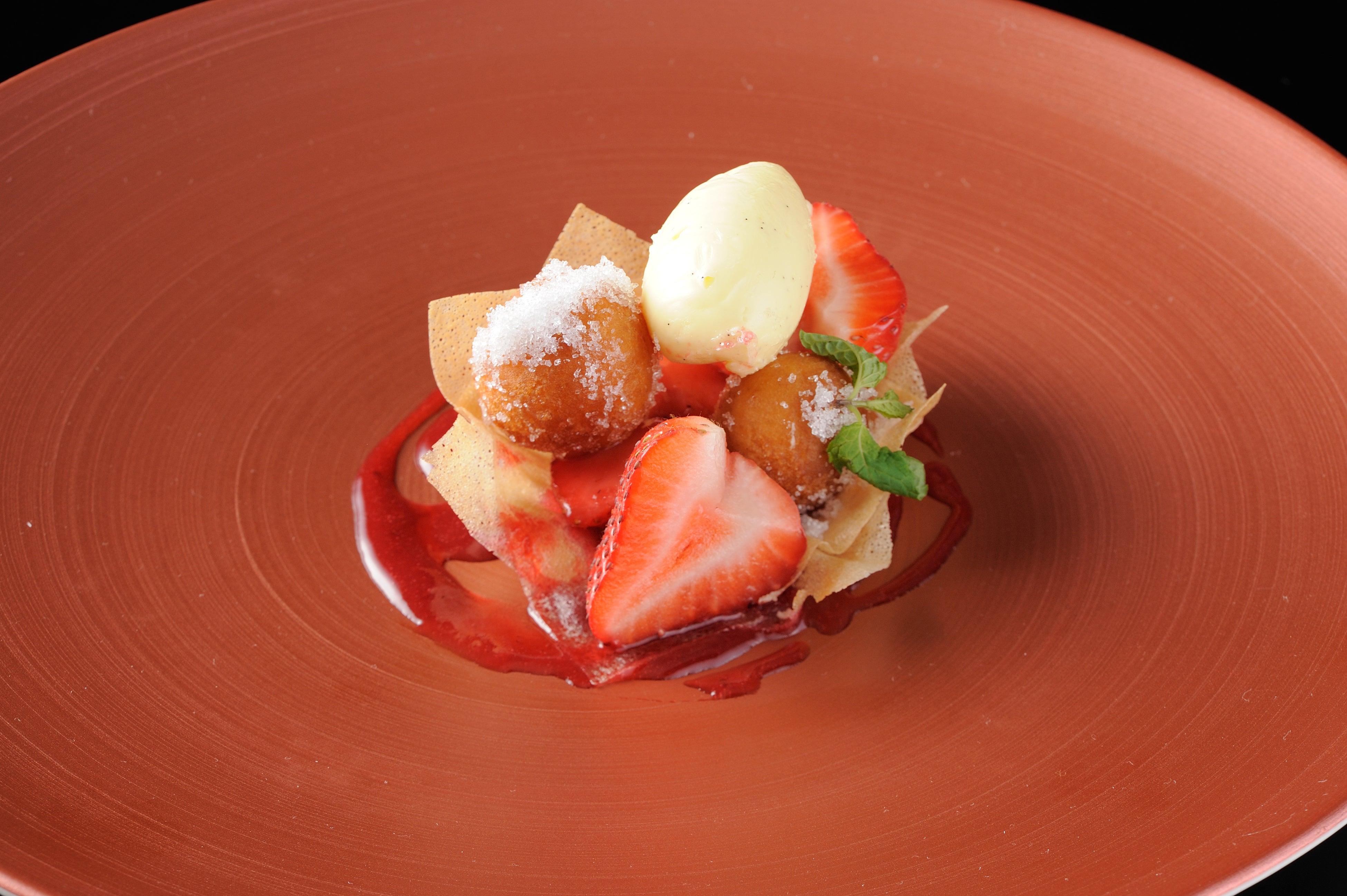 Warm donuts and melting ice cream—a perfect winter dessert with hot and cold contrasts