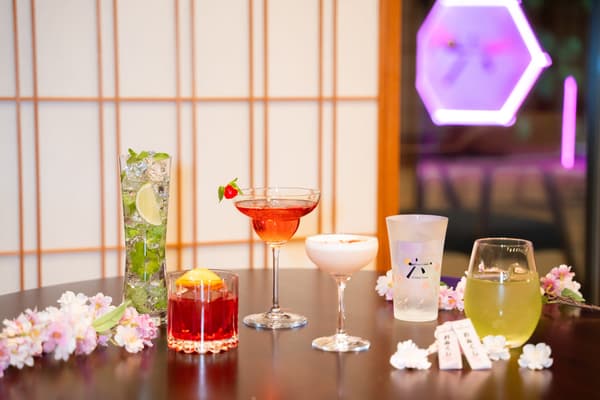 Six cocktails arranged in a row