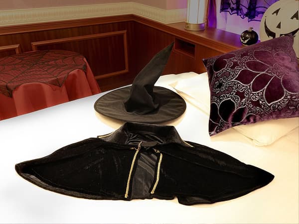 A witch costume is provided in the room