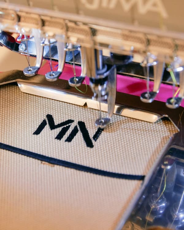 Pop-up exclusive initial embroidery service