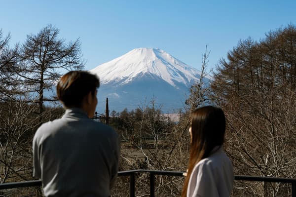 The view of Mount Fuji floating above the forest, seen from the rooftop balcony