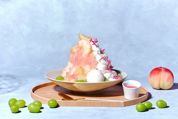 The dish balances the fruit's freshness with the rare cheese's refreshing tartness