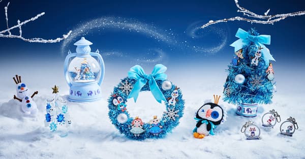 Decorations from the DISNEY FROZEN CHRISTMAS 2026 collection, including a wreath, a tree, and a snow globe