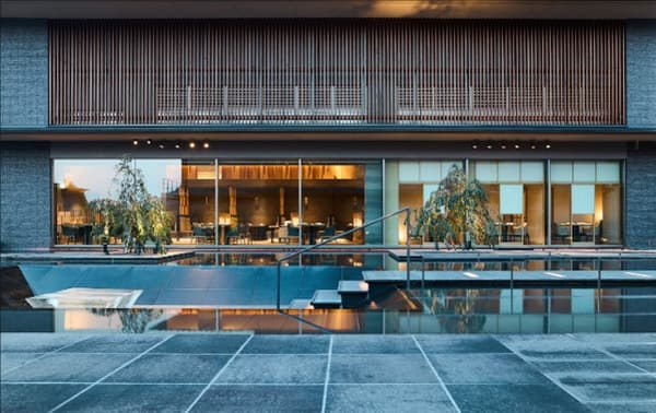 Hotel exterior with a reflecting pool