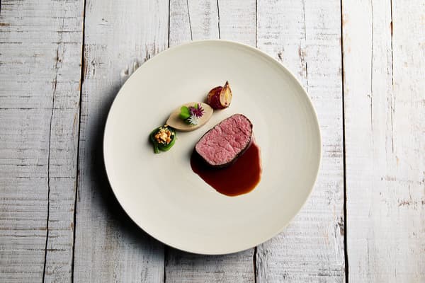 Roasted Akikawa beef filet with Tokyo-grown mushroom royale, caramelized pearl onion, and Sawanoi sauce