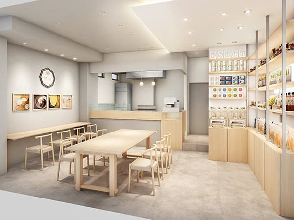 自然の木材を使用した温かみのある10席の店内には、大きな共同テーブルとカウンターがあり、ゆったりとしたペースで精米したばかりの米を楽しめます。