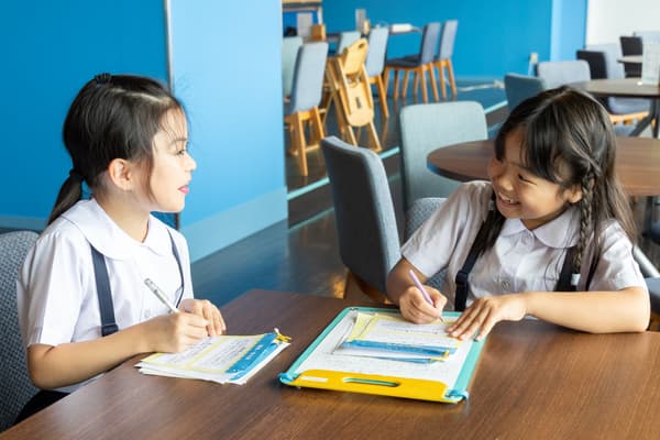 Students filling out the worksheet
