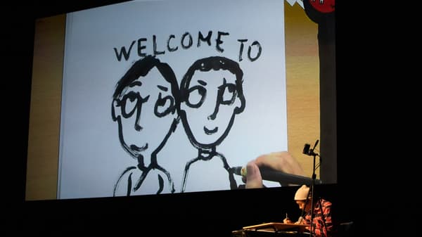 A live drawing projected on screen during the performance