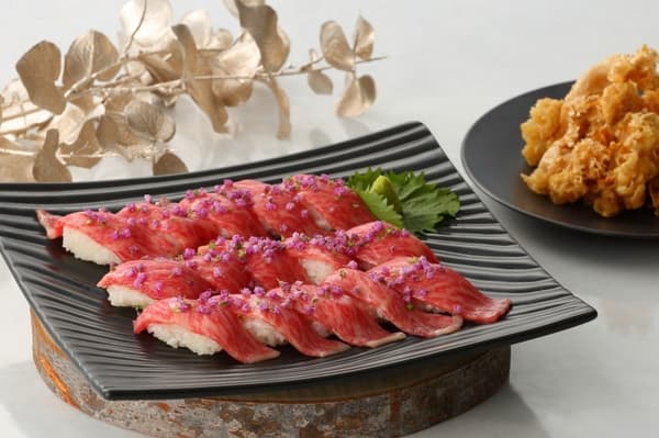 Seared domestic beef nigiri sushi and hanabiratake tempura