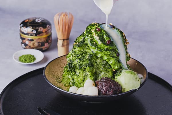 Adding the accompanying condensed milk sauce completes a harmonious balance of the matcha's aroma, umami, and pleasant bitterness