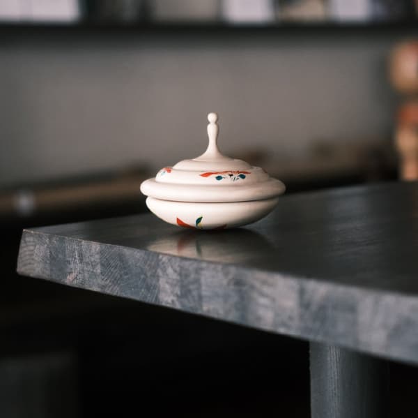 Spinning Kokeshi — spinning tops upcycled from offcuts produced during the kokeshi-making process