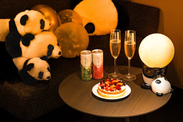 Anniversary room key and panda towels available as takeaway souvenirs