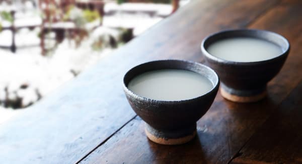 Two cups of nigori sake