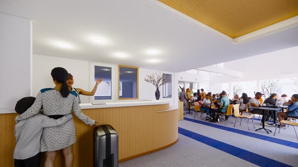 The front desk space at the entrance, designed to create warm connections among guests of different nationalities and generations from the moment they arrive.