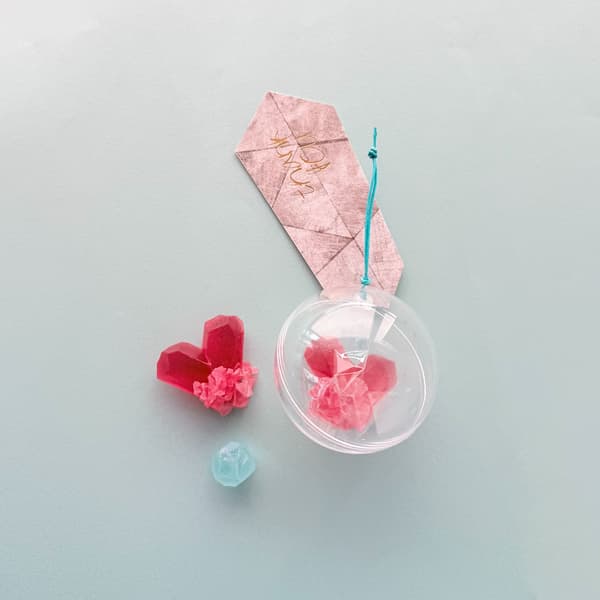 A heart-shaped Japanese crystal in raspberry flavor, paired with a bittersweet kabosu-flavored gem