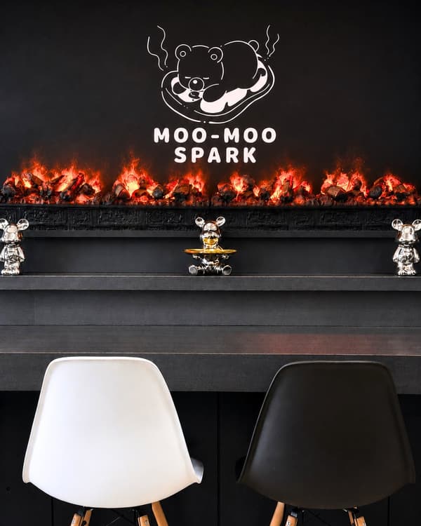 Counter seating, with a unique interior that includes a steam fireplace display