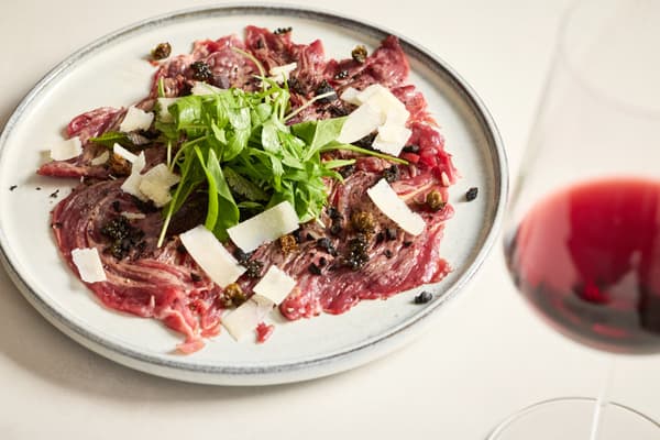 Hokkaido Tankaku Beef Seared Carpaccio with Caviar, Parmesan Cheese, Olives, and Fresh Herbs - 2,500 yen