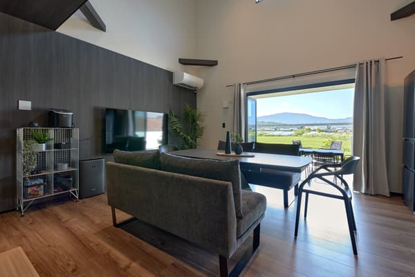 Private garden and mountain view through the large window