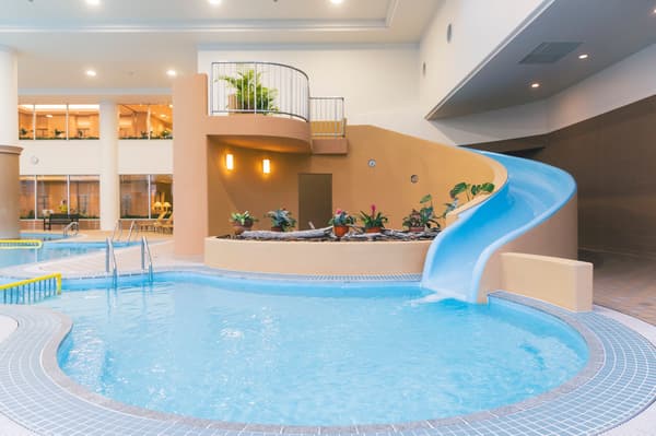 Indoor pool kids area with mini water slide