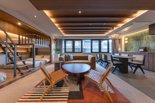 Apartment suite with a dining area and a living area