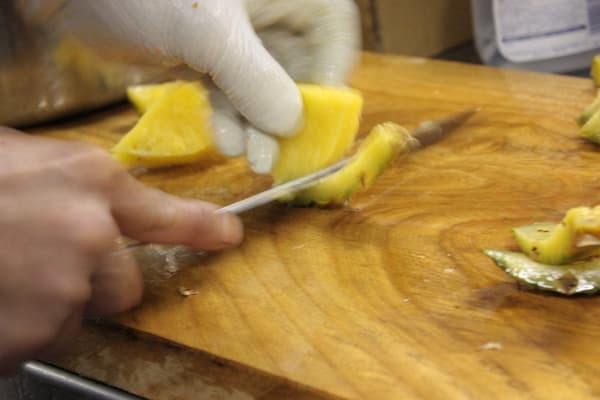 Wort and pineapple fermenting together in the brewing process