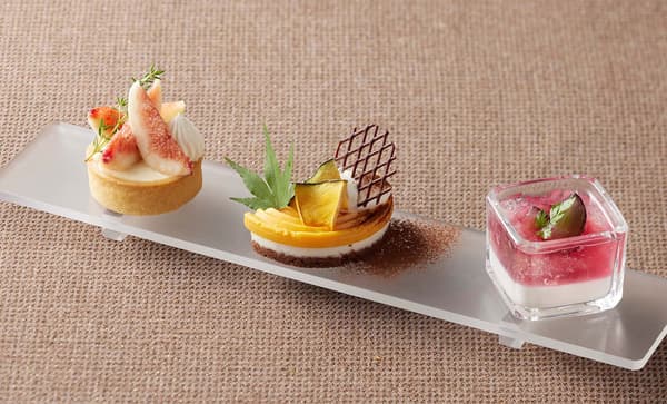 Fig tart, kabocha and fromage mousse, and vanilla blancmange with grape jelly