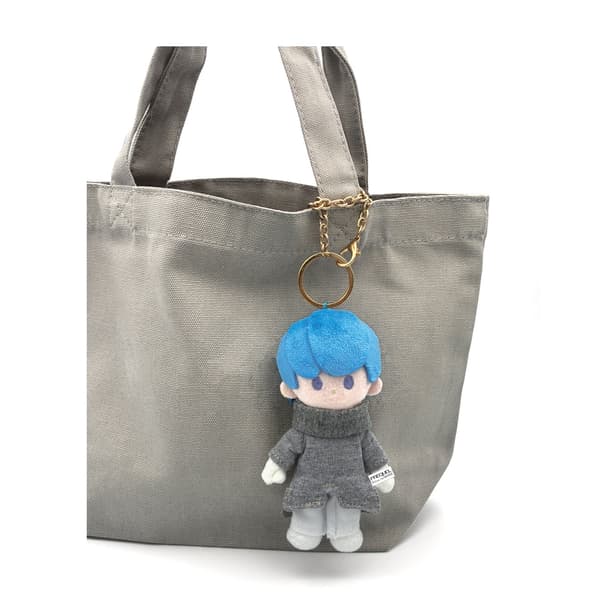 0 plush charm attached to a bag