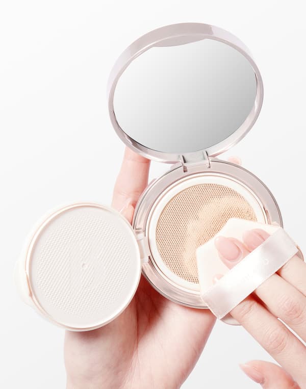 Gently glide the included puff over the mesh filter in a rolling motion.