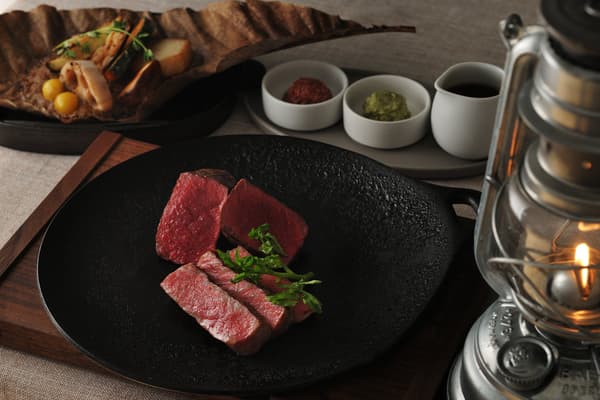 A dish that locks in the meat's umami, wrapped in smoke from pine needles and hiba cypress