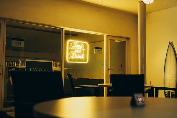 Rooftop cafe with a neon
