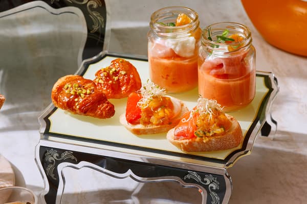 Savory dishes including tomato gazpacho and salmon mango salsa open sandwich