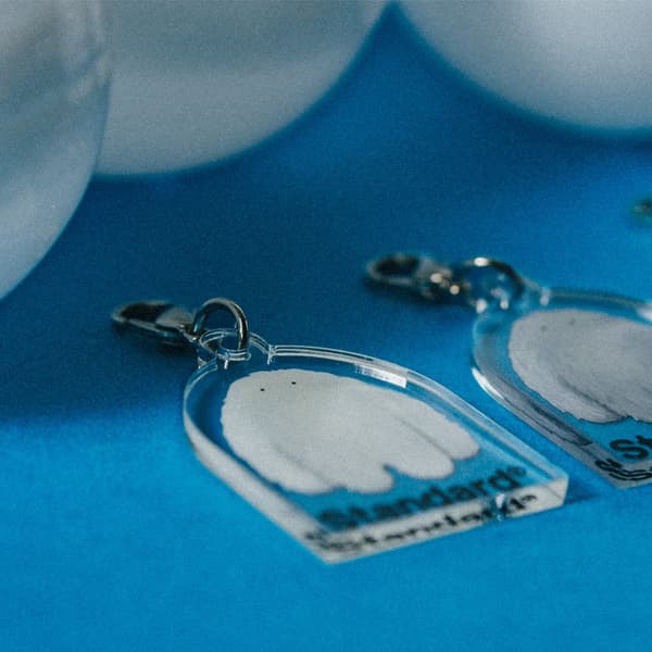 Yeti acrylic charms with clear plates and snap hooks