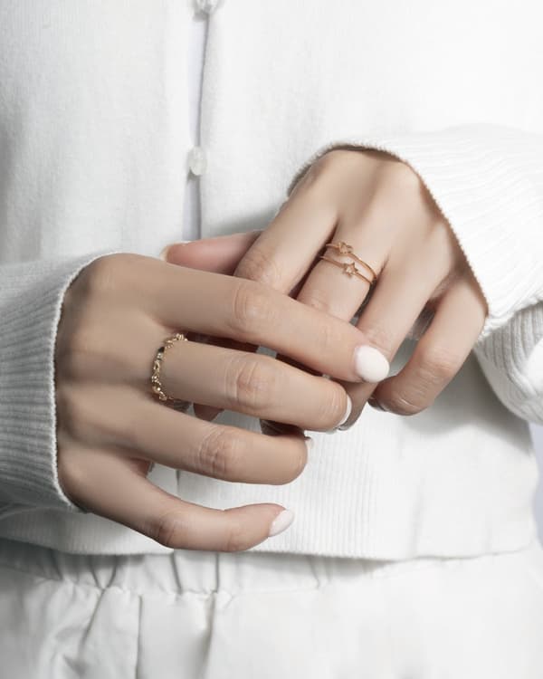 Styling image of little emblem jewelry