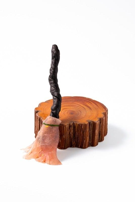 Witch's Broom with prosciutto and bamboo charcoal grissini