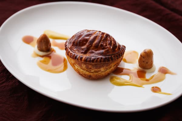 Hot foie gras chausson pie with two kinds of sauce