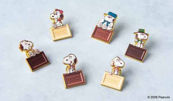 Pin lencana cokelat