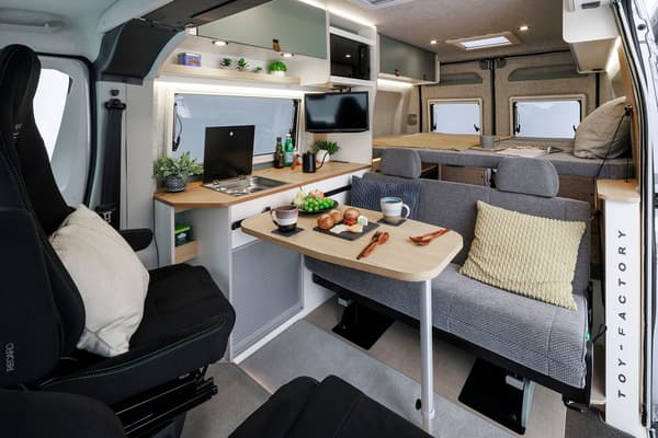 gioia interior — rotatable driver seat with easy access to sink, refrigerator, and microwave