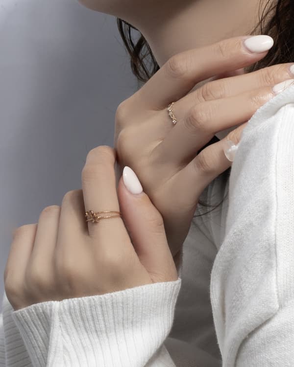 Styling image of little emblem jewelry