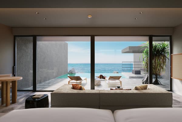 View of the sea from the guest room across the terrace and private pool