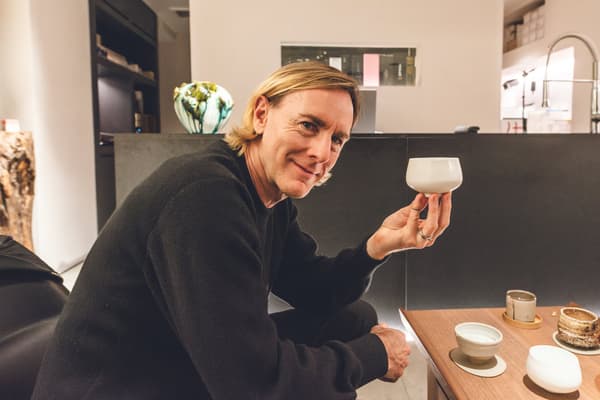 Richie Hawtin holding a sake cup
