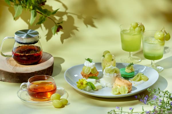 Afternoon tea featuring herbs, peaches, and muscat grapes