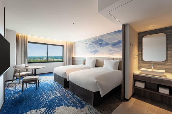 新娘和新郎在仪式前一晚入住的高级双床房