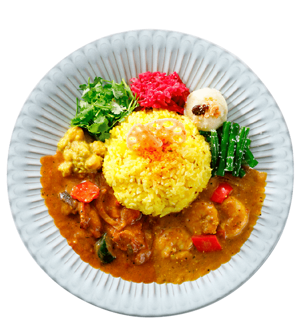 从左侧开始的彩色配菜：Chana Masala（鹰嘴豆咖喱）、香菜、紫甘蓝和甜菜油菜、椰子泥、青豆 thoran、莲藕片（在米饭上）