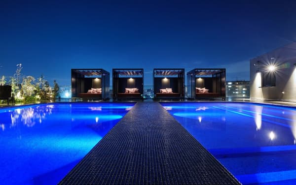 The night pool takes on a dreamlike look once the lights come on