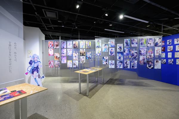 Exhibition view with artworks displayed on the walls