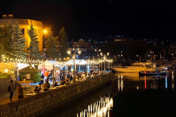 Illuminated view of Kita Unga at night