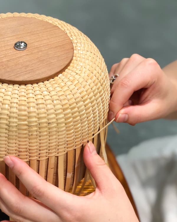 Basket-weaving experience, shown for illustrative purposes