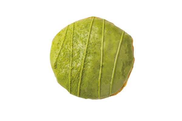 宇治抹茶Nama Malasada - 330日元：与抹茶混合的面团，优雅地涂上宇治抹茶巧克力。抹茶爱好者的不可抗拒的nama malasada。