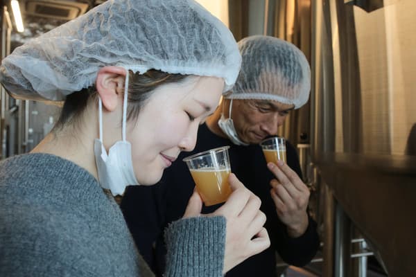 Guests touring the Soratoshiba brewery